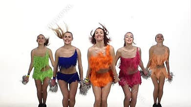 Girls dancing with pom-poms synchronously in
