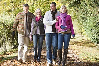 Multi-generation family enjoying autumn walk