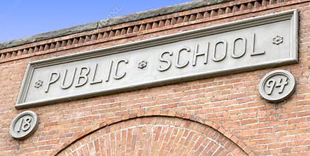 Public School Sign on Brick Building