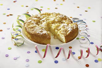 Fresh celebration cake on a white background