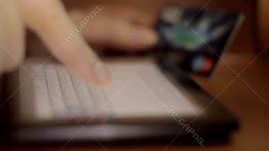 Close up of Human finger typing on virtual keyboard