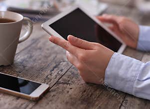 Digital tablet computer with isolated screen in female hands
