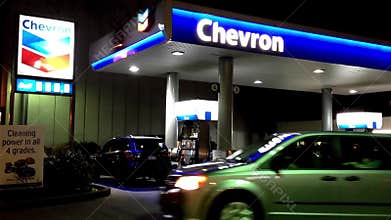 One side of Chervon gas station at night