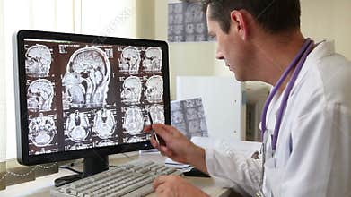 Doctor Examining CT scan