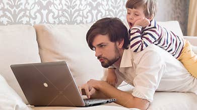 Son and dad working together