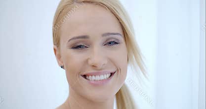 Pretty Smiling Woman Behind White Curtain