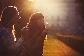 Women freedom and hope. Nature and harmony. Romantic sunset.