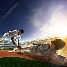 Two baseball player in action