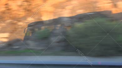 Shadow cast by the traveling bus