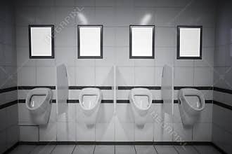 Empty advertisement frames in public toilet