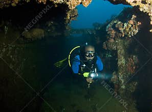 Diver Exploring Wreck