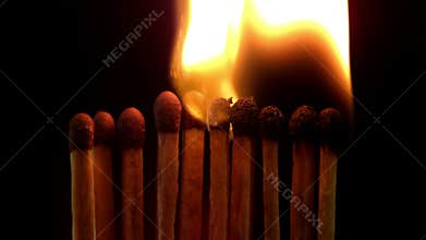 Matches lighting on black background