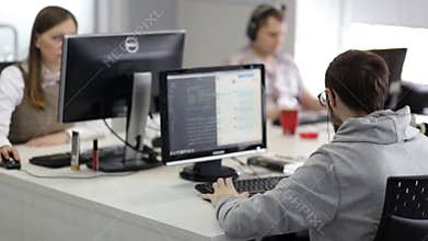 Software developers during the working process