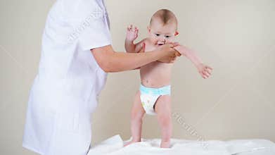 Baby boy getting physiotherapy