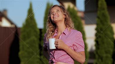 Young woman with a cup of coffee