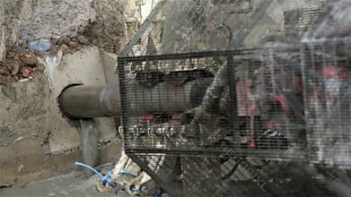 Construction - drilling ground anchor hole.