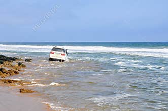 Adventurous Driving Along the Beach