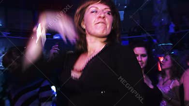 Girl is very scary and bad dancing at a party at