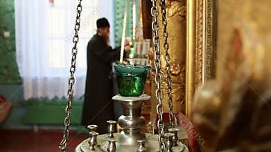 Old rite christian monk praying in a monastery
