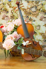 Violin,guitar, and rose
