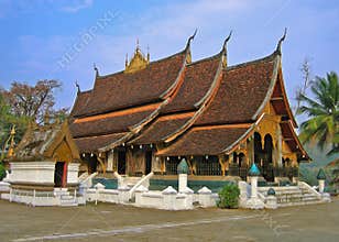 Traditional Buddhist Temple (Wat) in Laos with Golden Trim