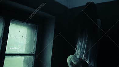 Spirit of the girl in an old scary house. limb of Satan