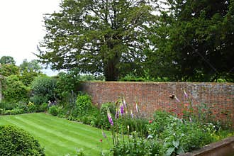 Lawn and Flower Borders in the Walled Garden, Tintinhull, Somerset, England, UK