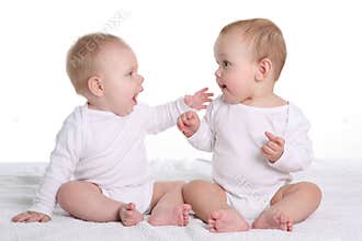 Two babies talking