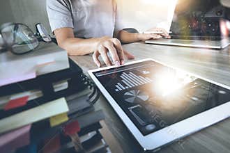 Website designer working digital tablet and computer laptop
