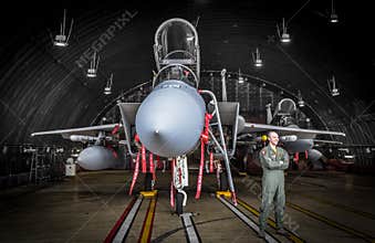 F15 fighter jet pilot in hangar