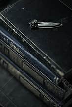 Still life of old books with bookmark