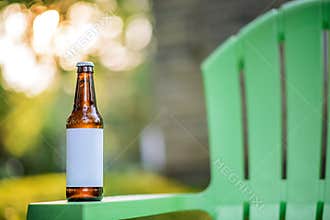 Blank Label Beer Bottle on Green Lawn Chair