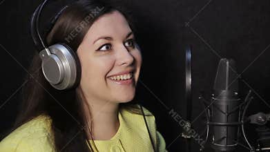 Girl in the studio reading a text