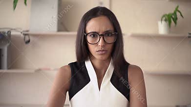 Portrait young angry woman in the room.