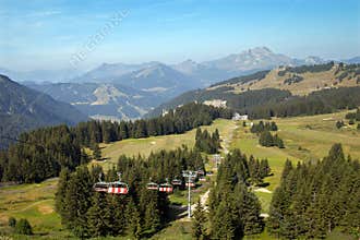 A chair lift in summer mountains