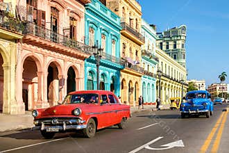 Vintage cars and colorful buildings in Old Havana
