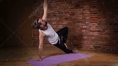 Man practicing advanced yoga