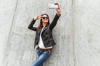 Beautiful girl makes selfie