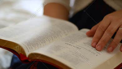 Married female reading the bible book