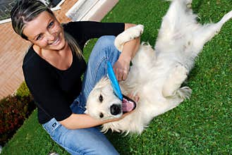 White dog and happy girl