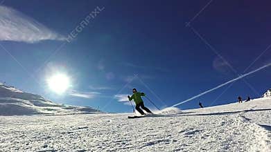 Skier having fun on sunny day
