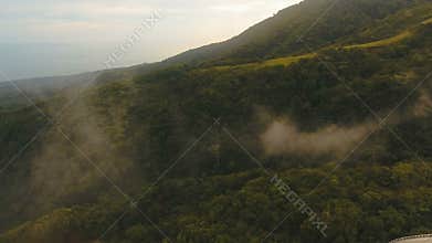 Aerial view evening rainforest. Camiguin island Philippines.