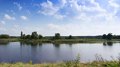 Idyllic riverbank landscape