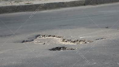 Pothole on the road