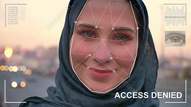 Futuristic and technological scanning of the face of a beautiful woman in hijab for facial recognition and scanned
