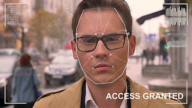 Futuristic and technological scanning of the face of a beautiful man for facial recognition and scanned person.