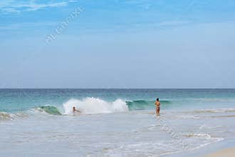 Tourists bathing Santa Mónica beach Boa Vista