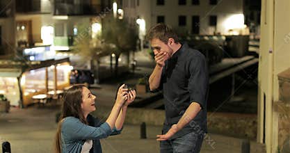 Girlfriend proposing marriage to her boyfriend