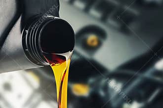 Pouring changing car engine oil