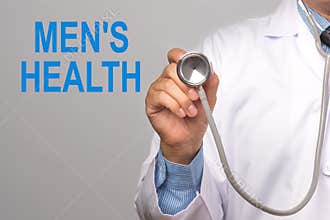 Doctor holding a stethoscope with men`s health word on gray back
